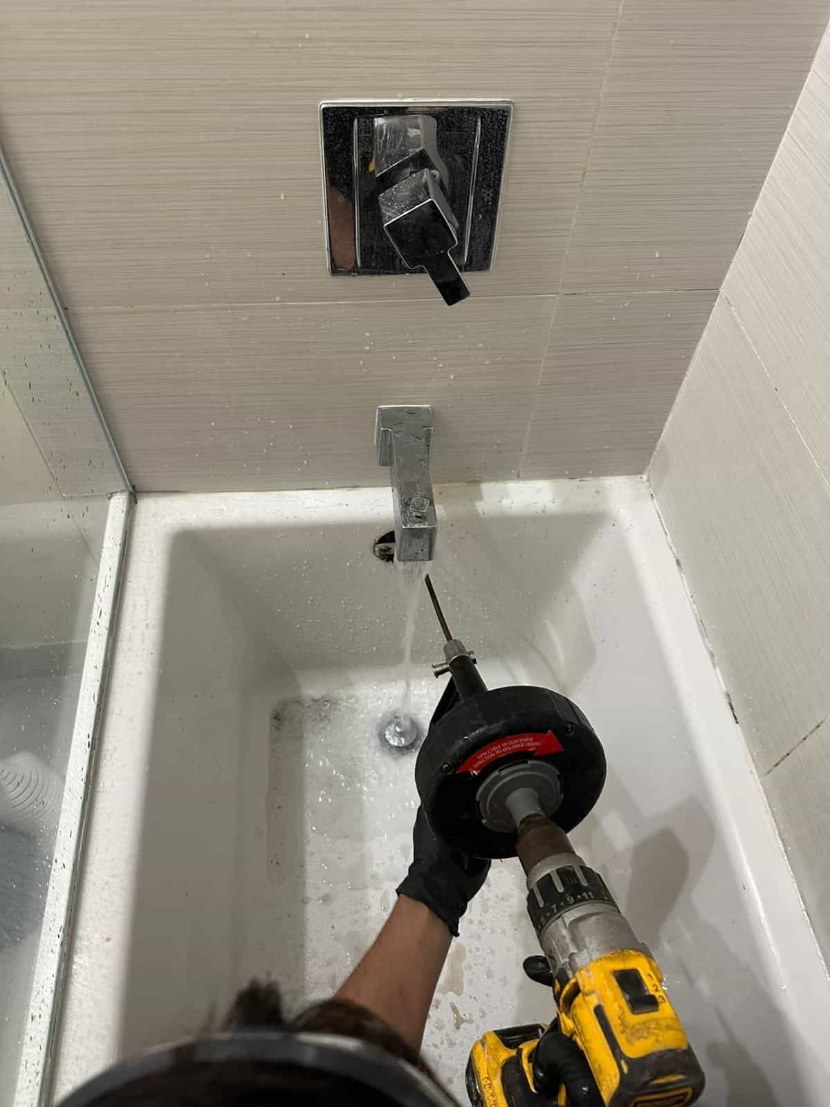 Before and after of a Drain cleaning by a plumber in Miami Dade