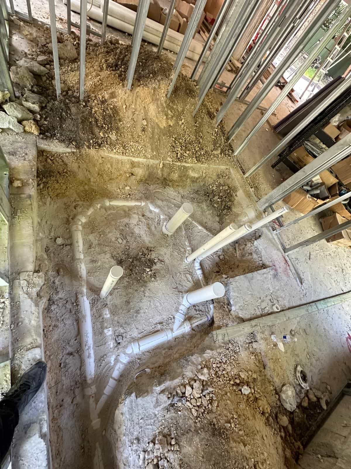 Before and after of a Underground pipe assemply by a plumber in Miami Dade